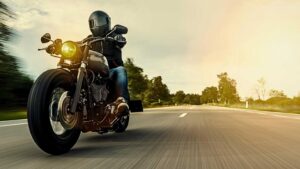 A motorcycle going down an Atlantic Canadian highway with zoom lines.