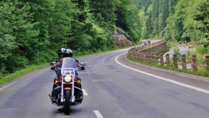 A motorcycle driving down an Atlantic Canadian highway.