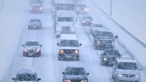 Vehicles on a highway during a winter storm in Atlantic Canada.