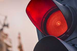 A picture of a red traffic light.