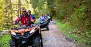 A group of ATV riders enjoying a beautiful day in a maritime forest