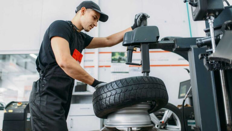 Mechanic performing a spring tire change in the Atlantic Canada